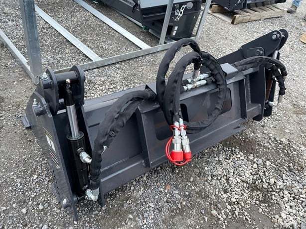 Wolverine Mini Skid Steer Combo Bucket